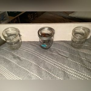 Hanging shelf with mason jars